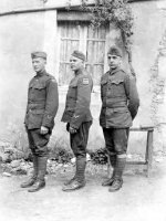  Monaco and two unidentified soldiers