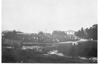 The band which came in with the first of the drafted man. The white building is the headquarters.