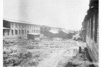 Some of the buildings along the main street. They are all alike, spaced the same distance apart and five in a row. The small ones are the bath houses and wash rooms.